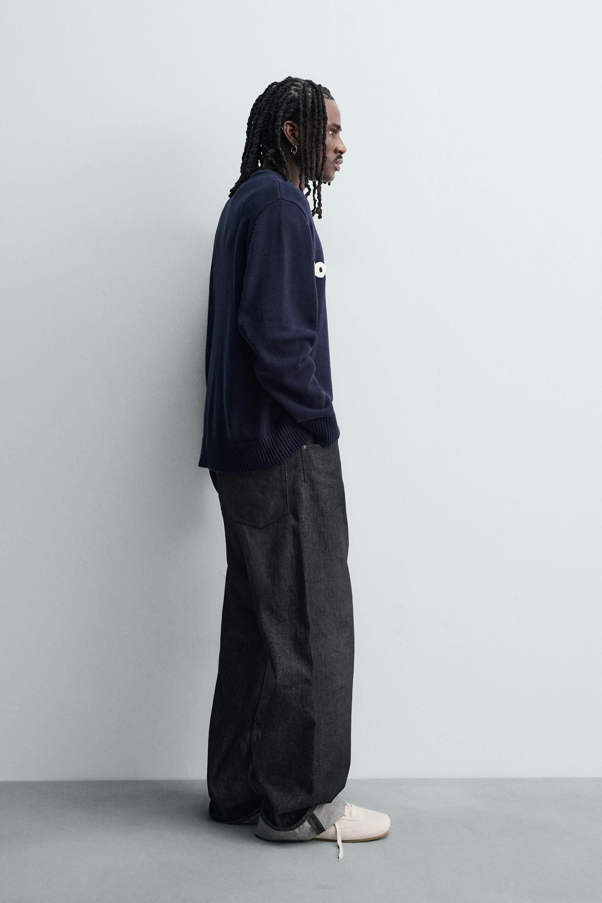 PULL AVEC INSCRIPTION BRODÉE